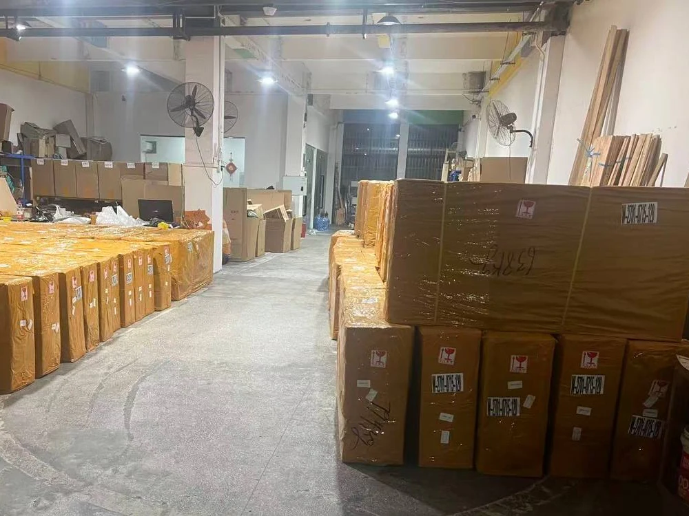 Consolidated Cargo — Boxes packed in protective film and reinforced tape.